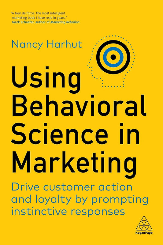 Book cover of 'Using Behavioral Science in Marketing' by Nancy Harhut with a yellow background and black text.