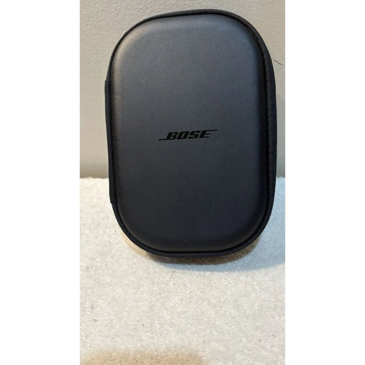 Black Bose case on a textured surface with a neutral background