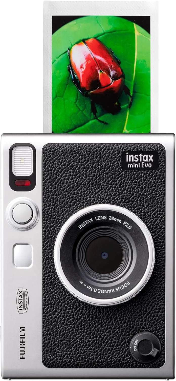 Fujifilm Instax Mini Evo camera with a photo of a red beetle on a green leaf.
