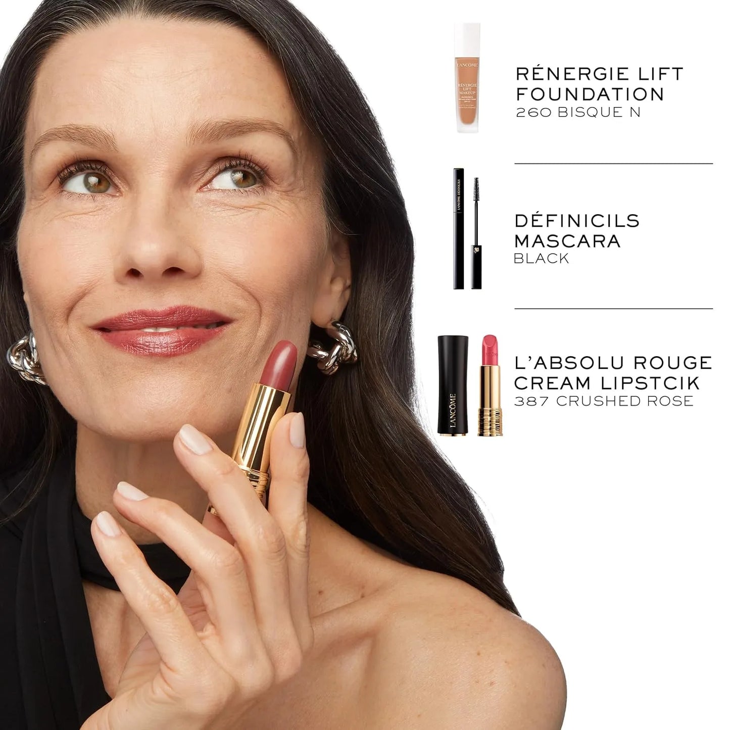 Woman applying lipstick with makeup products displayed on a white background