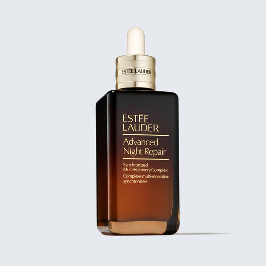 Estée Lauder Advanced Night Repair serum bottle on a light gray background