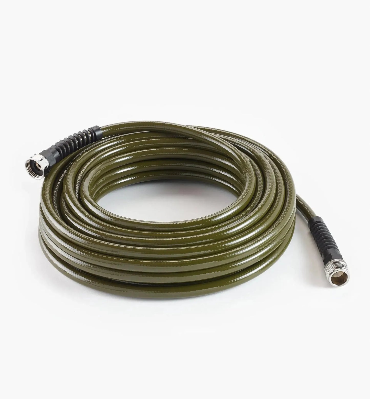Coiled green garden hose on a white background