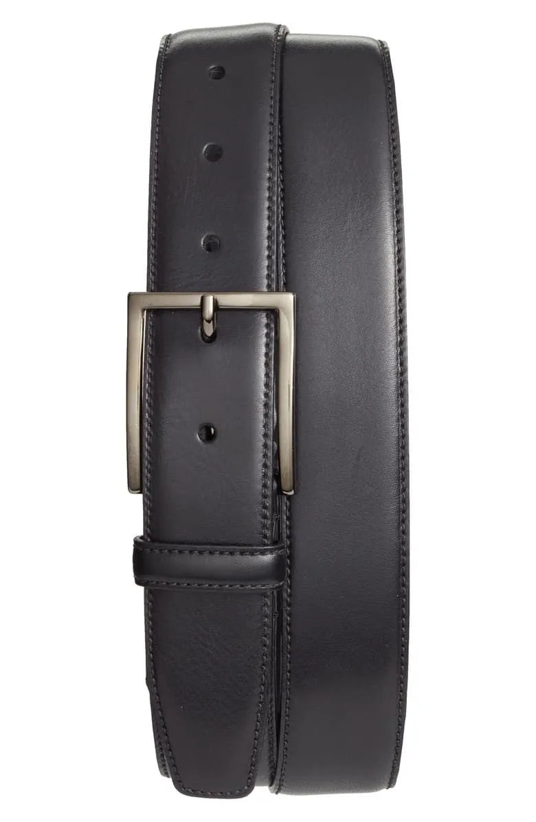 Black leather belt with a silver buckle on a white background